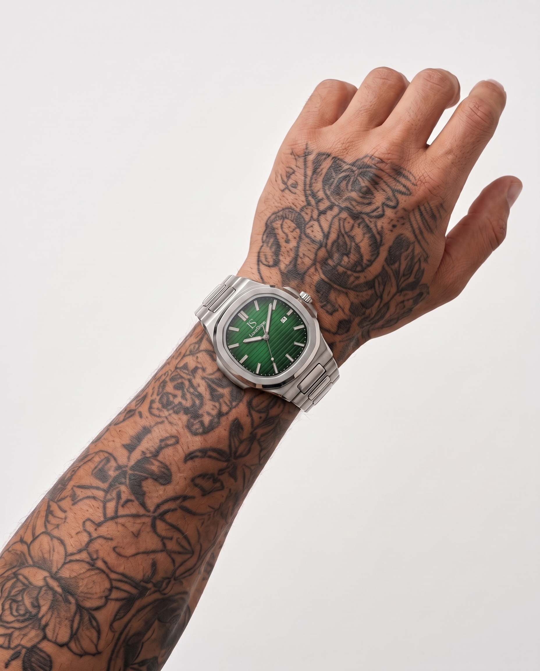 AI-GENERATED | source: Higgsfield nano_banana_2 | purpose: white-on-wrist-standard | product: CASPIAN | variant: Emerald Silver | variant_id: gid://shopify/ProductVariant/52455818920225 | model: approved-luxe-male-20260707 | date: 2026-07-10 | target: PDP gallery slot 2