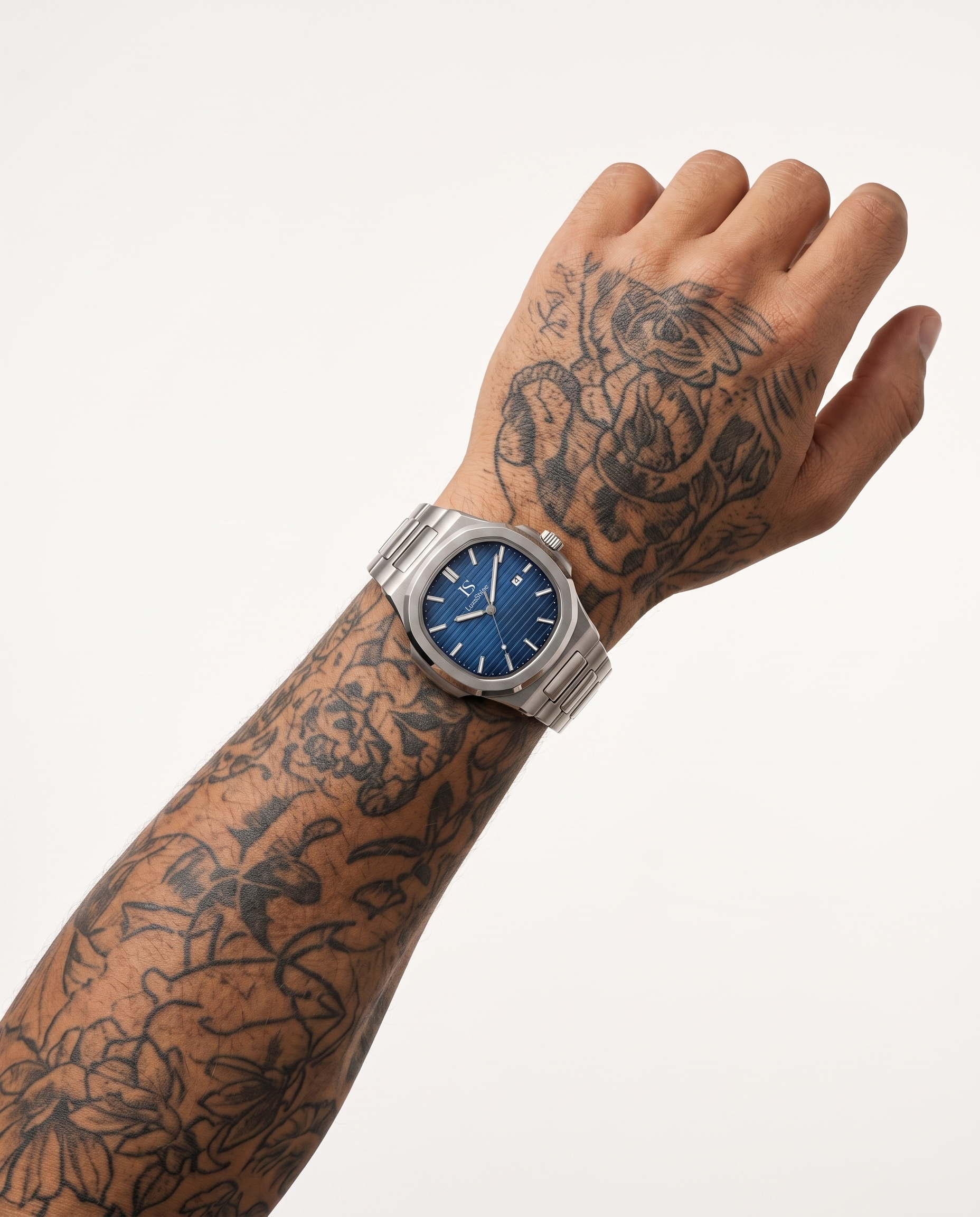 AI-GENERATED | source: Higgsfield nano_banana_2 | purpose: white-on-wrist-standard | product: CASPIAN | variant: Royal Silver | variant_id: gid://shopify/ProductVariant/52455818985761 | model: approved-luxe-male-20260707 | date: 2026-07-10 | target: PDP gallery slot 2