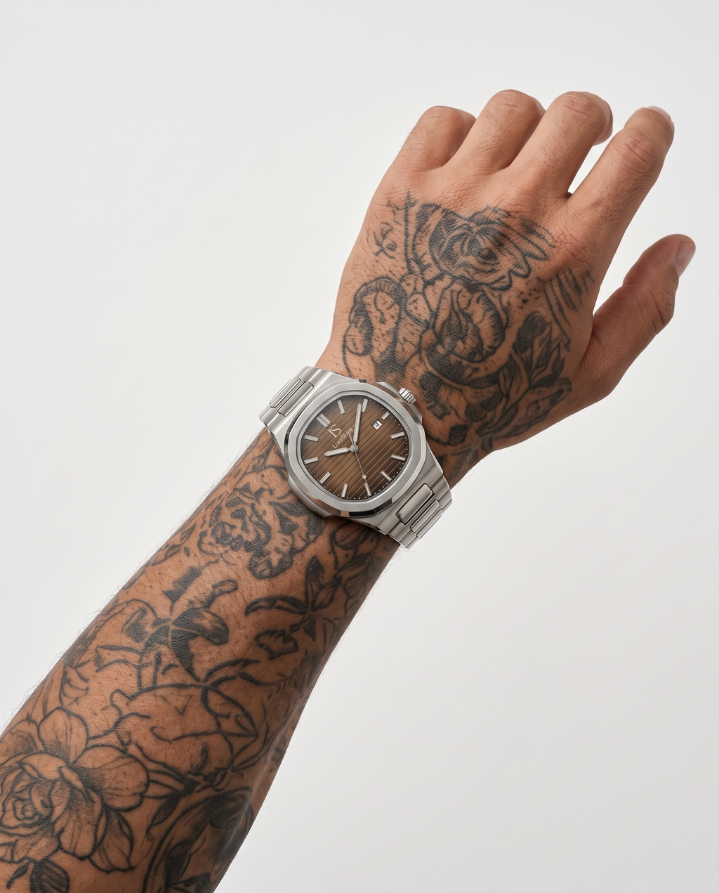 AI-GENERATED | source: Higgsfield nano_banana_2 | purpose: white-on-wrist-standard | product: CASPIAN | variant: Tobacco Sunbrust | variant_id: gid://shopify/ProductVariant/52313877807393 | model: approved-luxe-male-20260707 | date: 2026-07-10 | target: PDP gallery slot 2