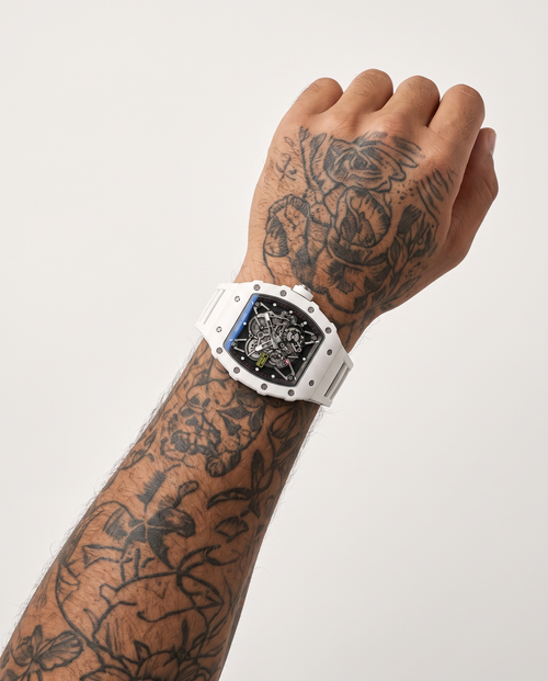 AI-GENERATED | source: Higgsfield nano_banana_2 | purpose: white-on-wrist-standard | product: Aeropulse | variant: Arctic White | variant_id: gid://shopify/ProductVariant/52455663534369 | model: approved-luxe-male-20260707 | date: 2026-07-10 | target: PDP gallery slot 2
